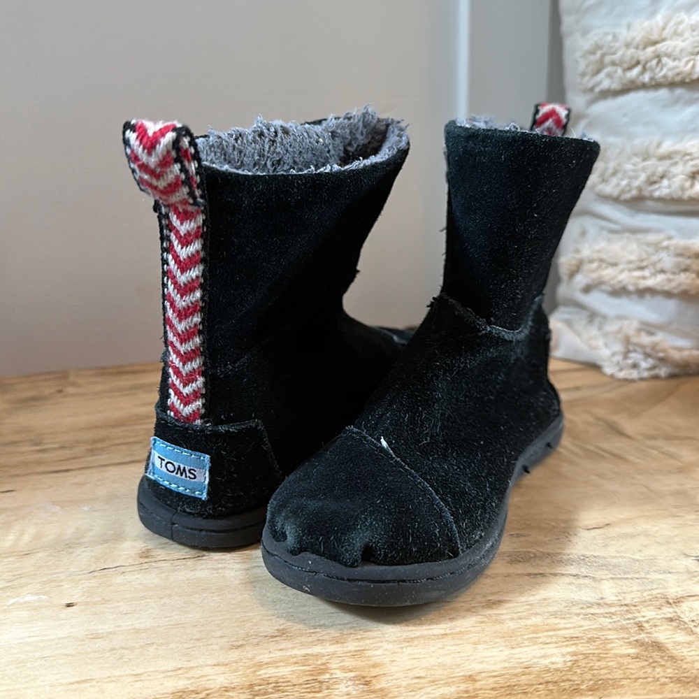 Toms suede toddler boot with chevron strip down back. Super cute and stylish.